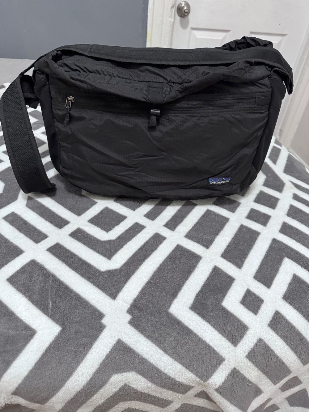 Patagonia Black Messenger Bag with Front Zip Pocket